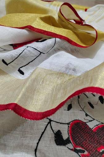 Handwoven white linen saree with embroidery work