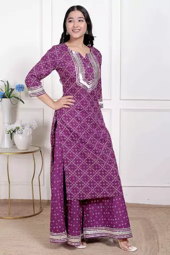  women cotton magenta gota work kurta with flared palazzo