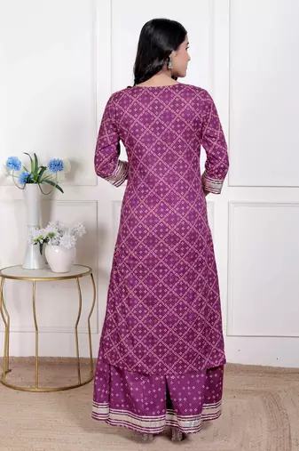  women cotton magenta gota work kurta with flared palazzo