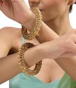 Gold plated kundan bangle