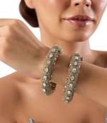 Gold plated kundan bangle