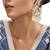 Gold plated green stone kundan chandbali earrings