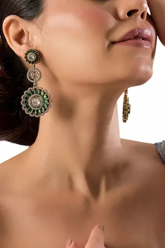 Gold plated green stone kundan dangler earrings