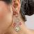 Gold plated pink stone dangler earrings