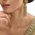 Gold plated kundan tassel earrings