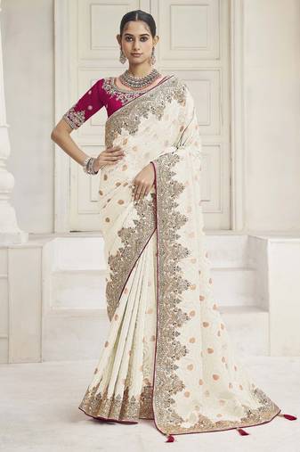 Cream color handwork and zari-cord tissue viscose saree with designer blouse fabric