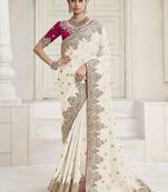 Cream color handwork and zari-cord tissue viscose saree with designer blouse fabric