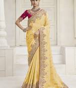 Yellow color handwork and zari-cord tissue viscose saree with designer blouse fabric