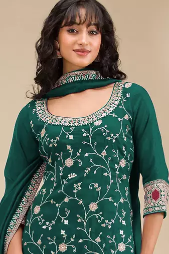 Teal embroidered faux chiffon salwar suit