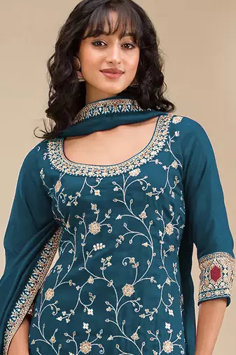 Dark aqua blue embroidered faux chiffon salwar suit