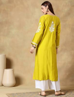 Chikankari yellow  color embroided roman silk kurta for women  2