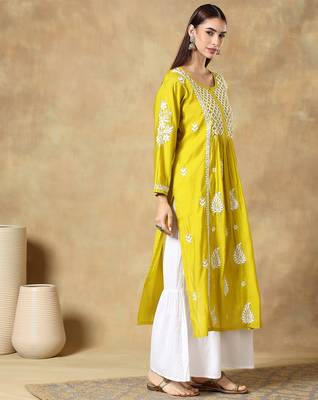 Chikankari yellow  color embroided roman silk kurta for women  3