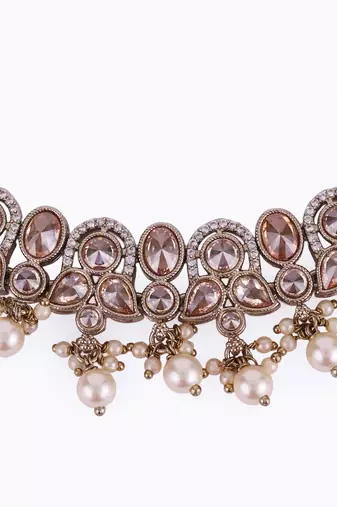 Splendid leaf and paisley design pearls guchha gold plated choker necklace set with maangikka for women and girls