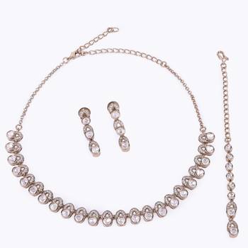 Glimmery round shape cz studded gold plated choker necklace set with maangikka for women and girls 4
