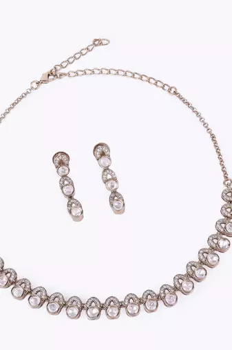 Glimmery round shape cz studded gold plated choker necklace set with maangikka for women and girls