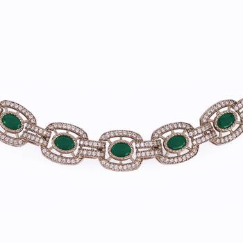 Flowing round shape cz studded gold plated green stone choker necklace set with maangikka for women and girls 2