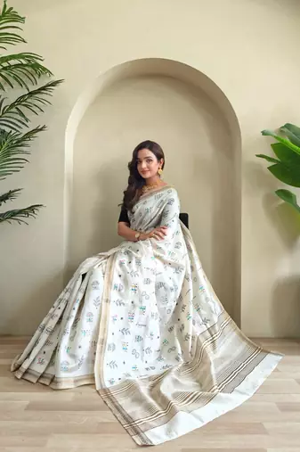 WHITE LOOM TUSSAR SAREE WITH ALL OVER WORLI EMBROIDERY PATTERN