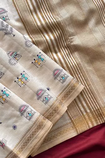 WHITE LOOM TUSSAR SAREE WITH ALL OVER WORLI EMBROIDERY PATTERN