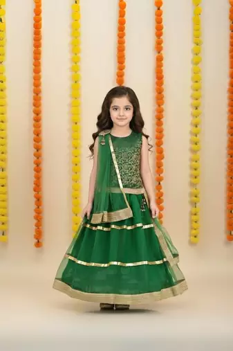 Green plain net stitched sleeveless lehenga
