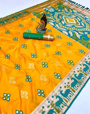Yellow soft saree with zari weawing meenakari rich pallu and unique ikkat border 1