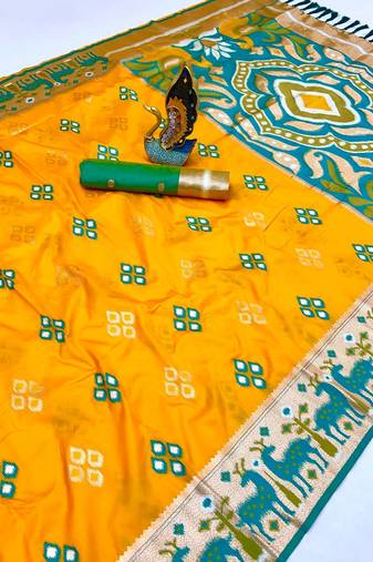 Yellow soft  saree with zari weawing meenakari rich pallu and unique ikkat border