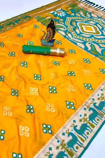 Yellow soft  saree with zari weawing meenakari rich pallu and unique ikkat border