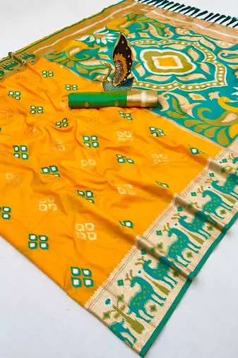 Yellow soft saree with zari weawing meenakari rich pallu and unique ikkat border