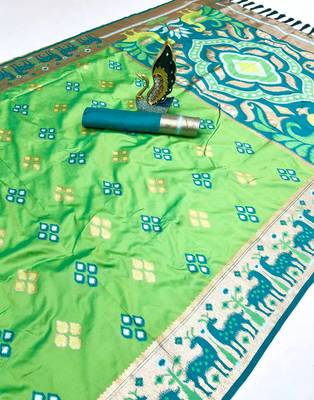 Green soft saree with zari weawing meenakari rich pallu and unique ikkat border 1