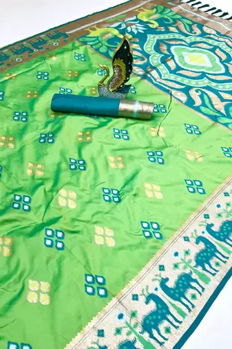 Green soft  saree with zari weawing meenakari rich pallu and unique ikkat border