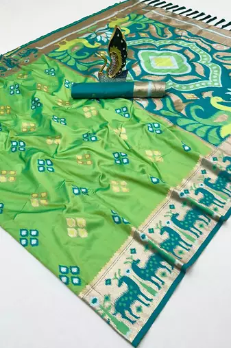 Green soft saree with zari weawing meenakari rich pallu and unique ikkat border