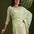 Green color gota-patti weaves checks body and tiny gold zari weave butties  tissue linen silk saree with blouse