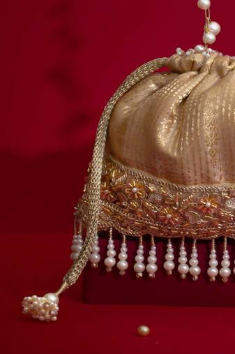 Beige embroidered  silk potli bag