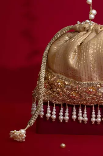 Beige embroidered  silk potli bag