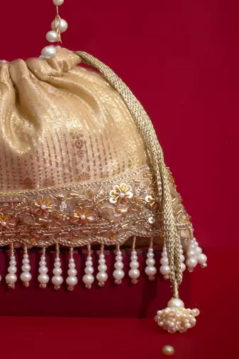 Beige embroidered  silk potli bag