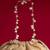 Beige embroidered  silk potli bag