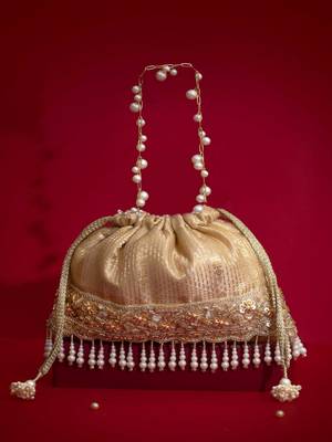 Beige embroidered  silk potli bag 4