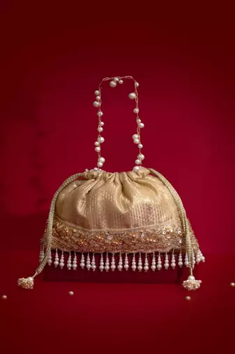 Beige embroidered  silk potli bag