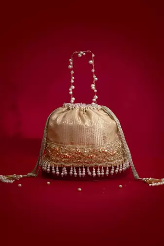 Beige embroidered  silk potli bag