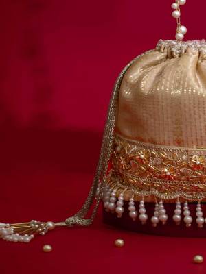Beige embroidered  silk potli bag 2