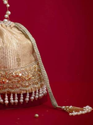 Beige embroidered  silk potli bag 3
