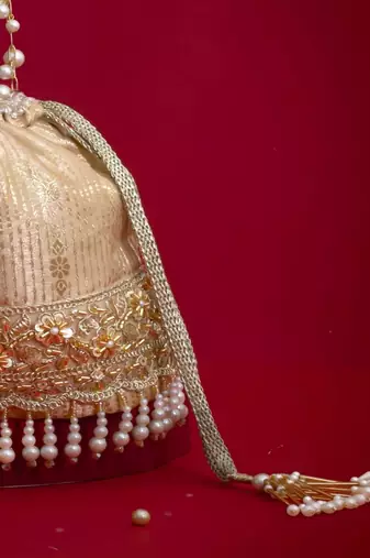 Beige embroidered  silk potli bag