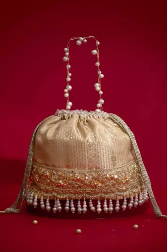 Beige embroidered  silk potli bag
