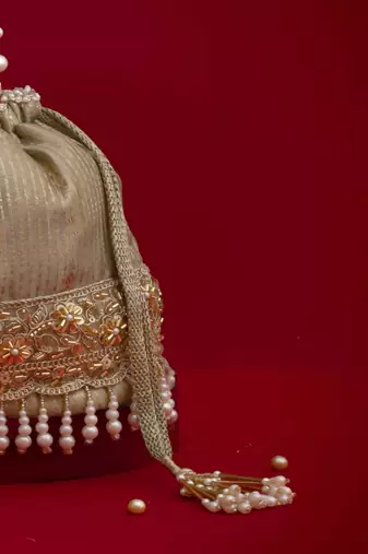 Grey embroidered  silk potli bag