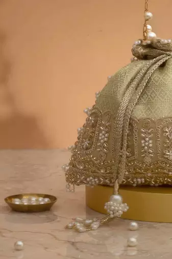 Mint  embroidered  silk potli bag