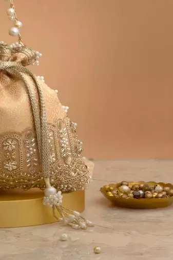 Peach embroidered  silk potli bag