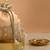 Peach embroidered  silk potli bag
