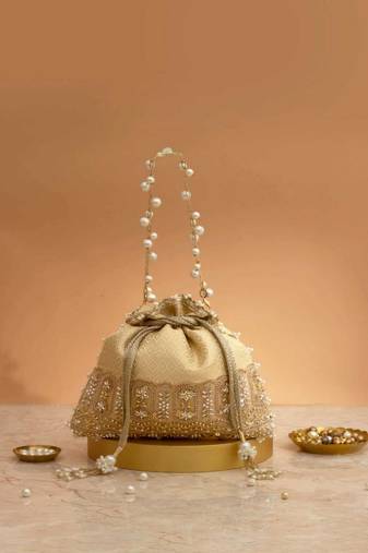Cream embroidered  silk potli bag
