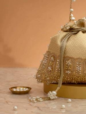 Cream embroidered  silk potli bag 2