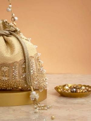 Cream embroidered  silk potli bag 3
