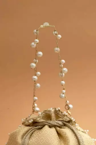 Cream embroidered  silk potli bag